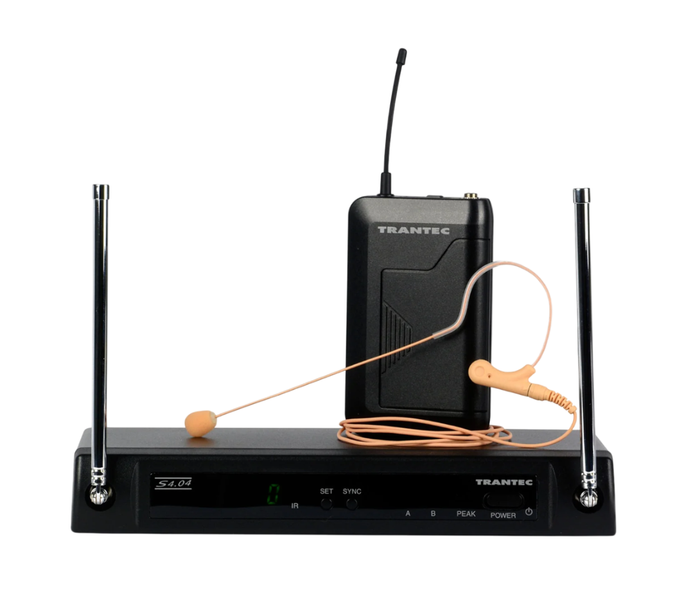 Front-facing shot of a Trantec S4.04E UHF 4 Frequency Earworn System laid out individually