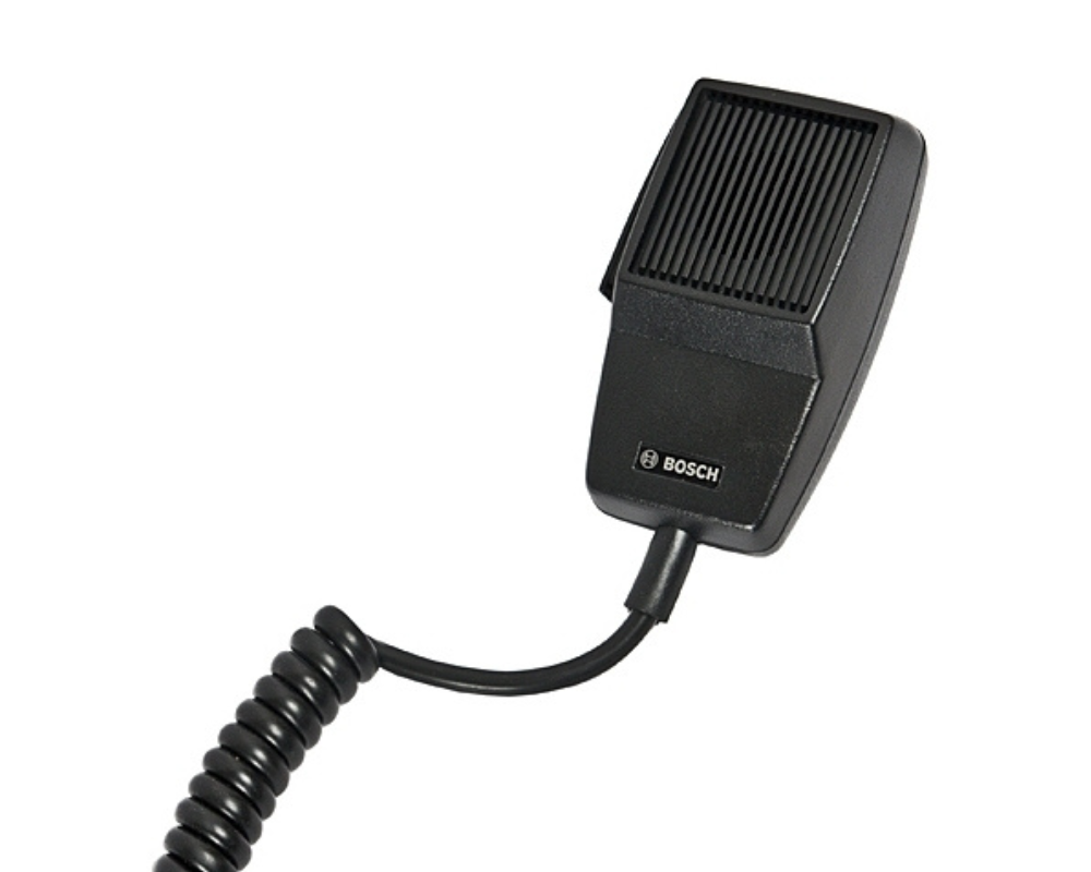 Close-up shot of a matte black Handheld Omnidirectional Dynamic Fist Microphone with cable attached